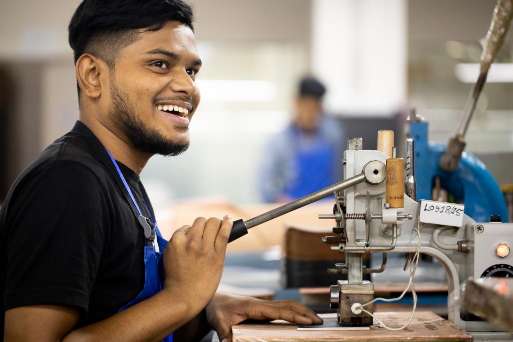 Working and smiling man