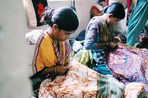 Women in Bangladesh making blankets