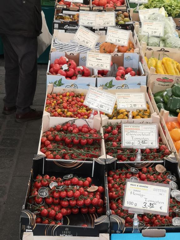 Selection of tomatoes in an open green market in Munich