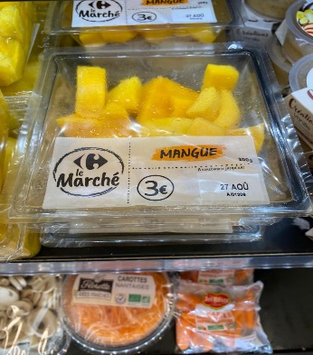 French supermarket promotion of freshly cut mangoes