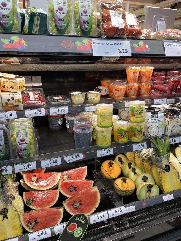 Aisle of convenience fruit at a Spanish supermarket