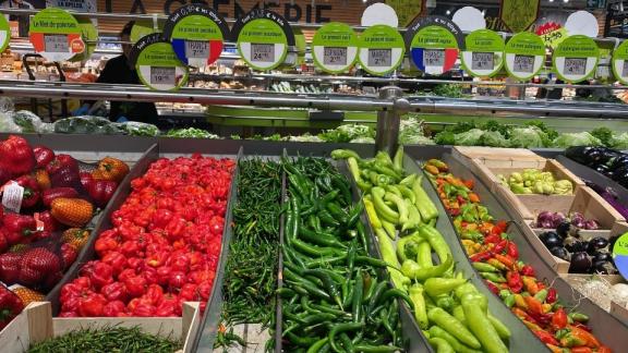 Chilli pepper display in French supermarket Grand Frais