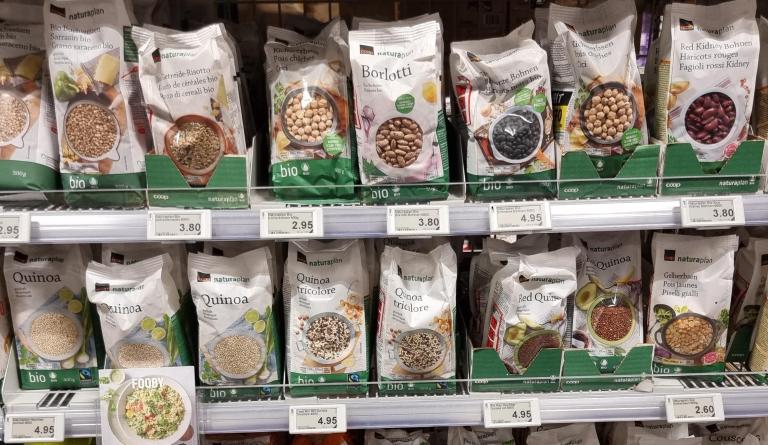 Wide variety of grains and pulses in a European supermarket shelf 