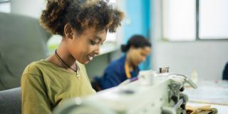 Women making leather products